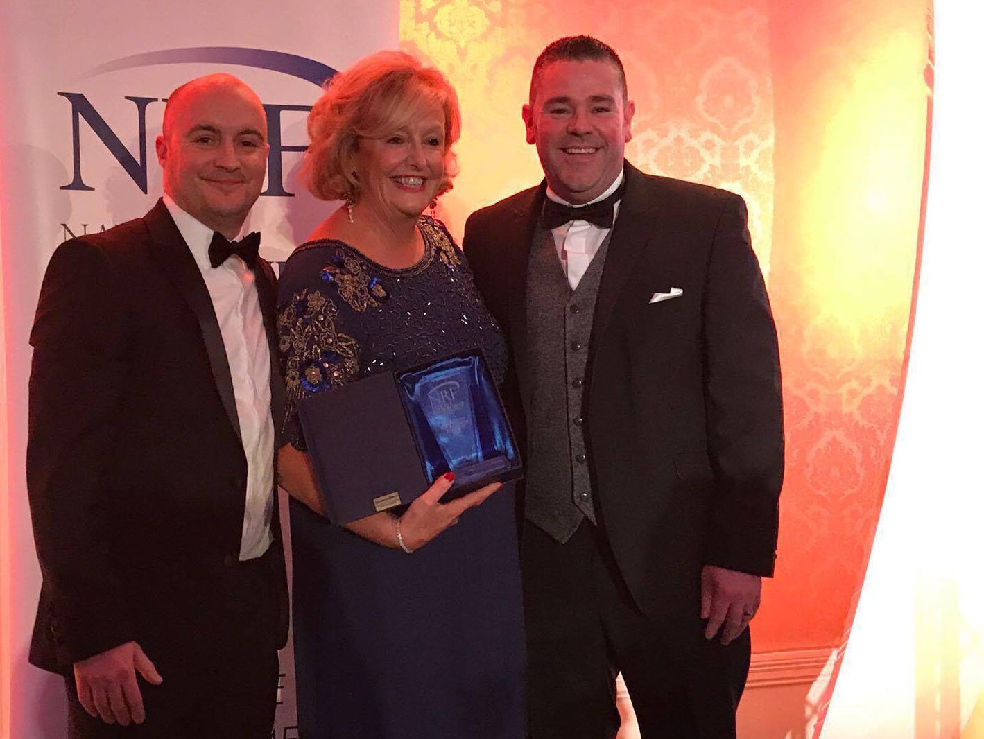 Mark Byrne, Commercial Director and Barbara McGrath, MD collect the award for Best in Practice (Sales Division) at the NRF Awards